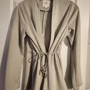 Beautiful suede like cardigan/ blazer with waist cinched.